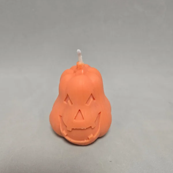 Calabaza, vela, halloween Calabaza Halloween con cara traviesa.Calabaza Halloween con cara traviesa de cera de girasol y colorante orgánico naranja.